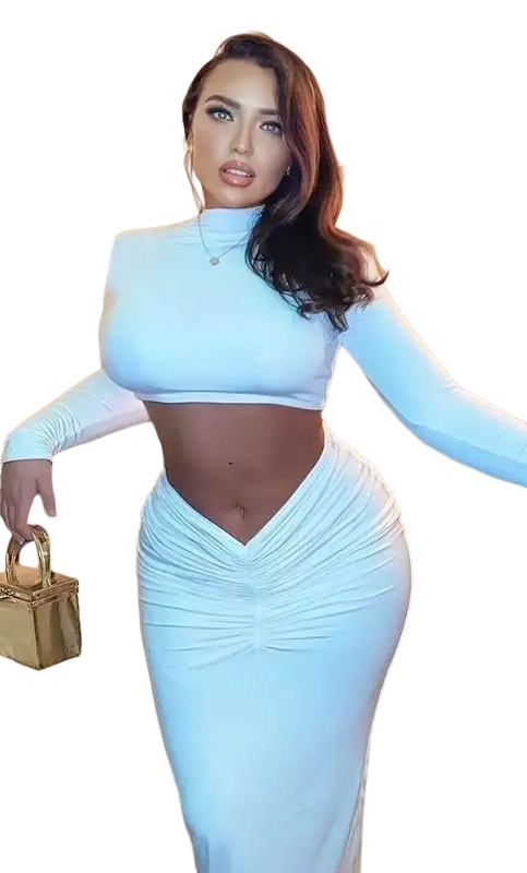Woman in white crop top and skirt from Yara Summer Long Sleeve Ruched Set