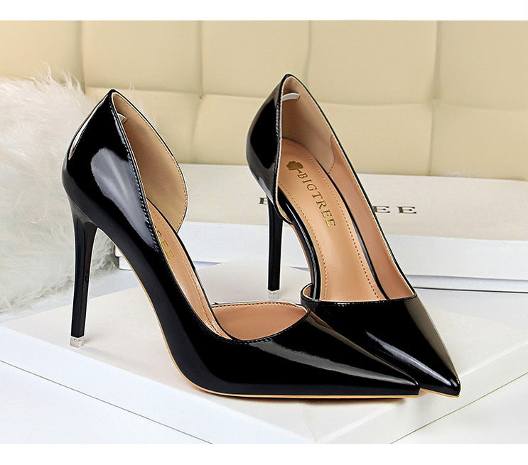 Langry fashion black patent leather pointed toe stiletto pumps with clear metal heels