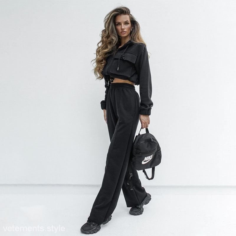 Woman in black cropped hoodie and wide-leg pants showcasing Elegant Vetements Suit