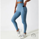 Light blue high-waisted yoga pants with side pocket and hip lift design
