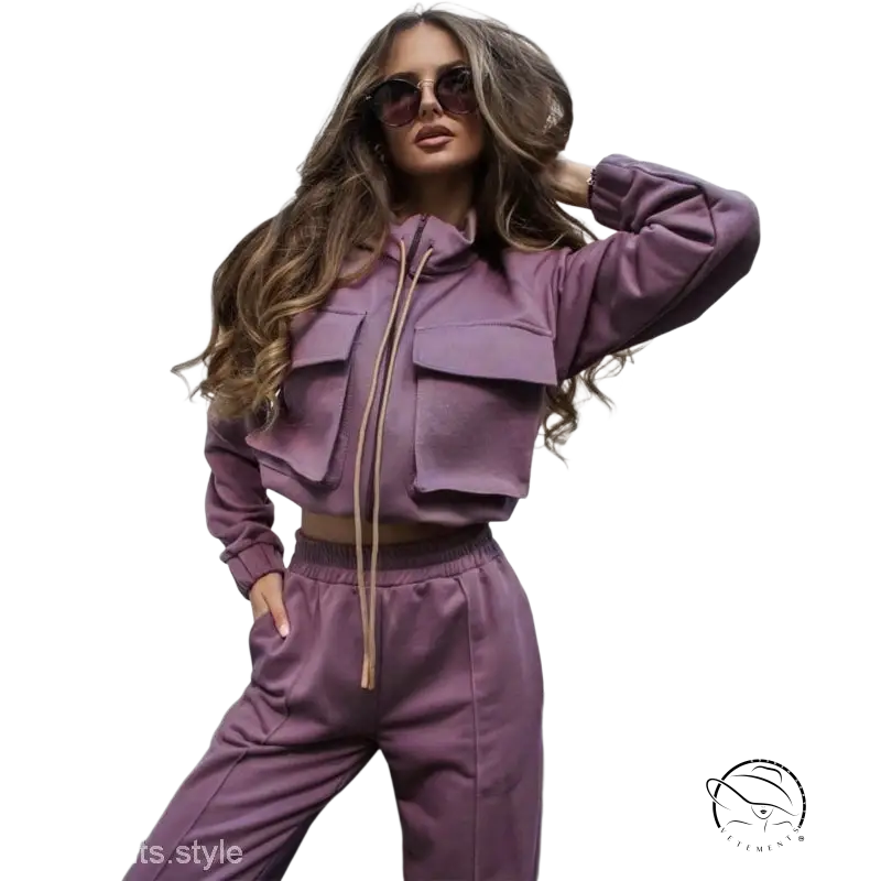 Woman in elegant vetements suit with long sleeve mauve tracksuit