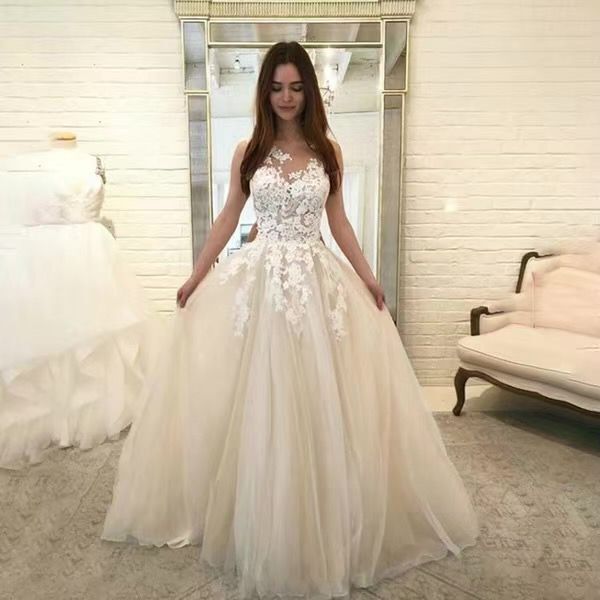 Elegant white floral wedding gown in the Elegant Lace Dress showcasing stunning fashion