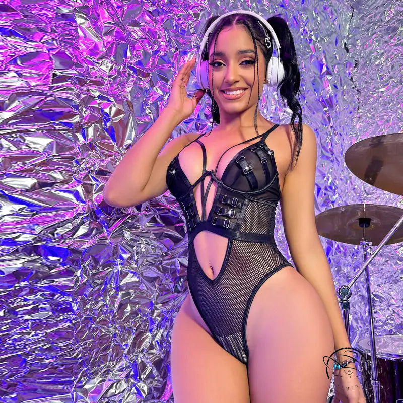 Woman in cute fishnet bustiers teddies metal tight black mesh bodysuit