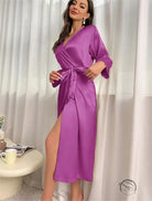 Vibrant purple langry fashion wrap dress with high slit and bell sleeves