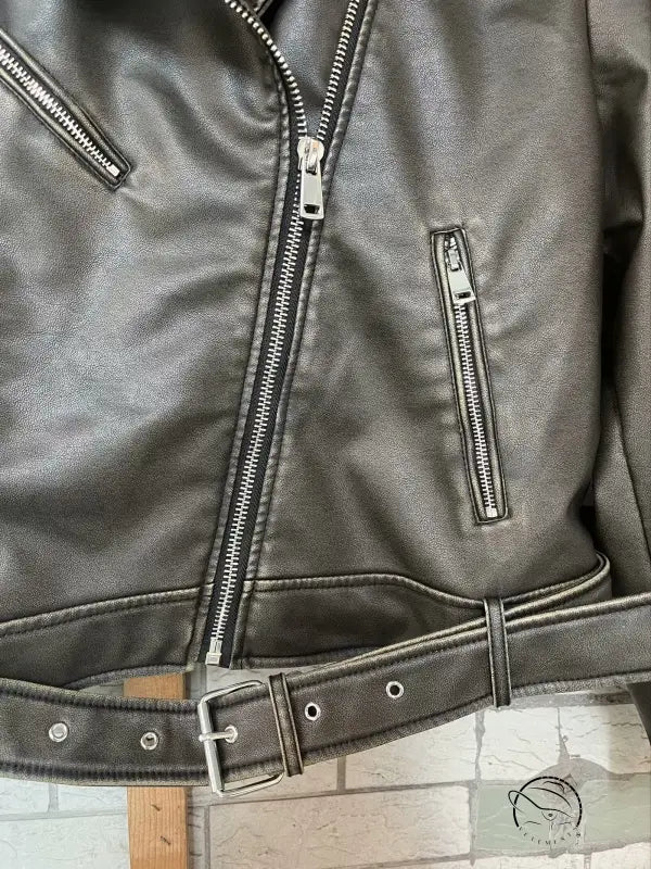 Beautiful warm langry leather jacket with silver zippers and belt