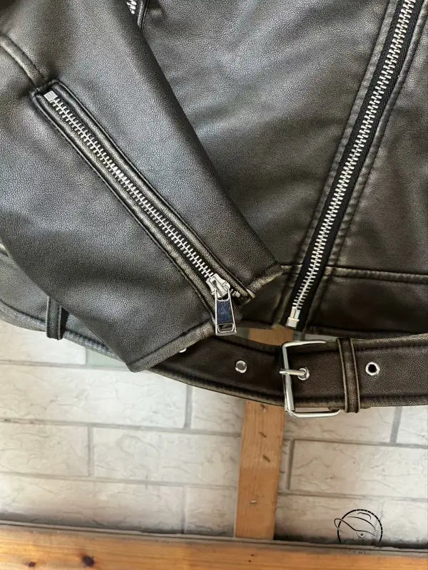 Beautiful warm leather jacket with silver zippers and belt loops