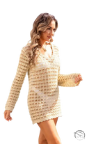 Beige knitted crochet summer beach blouse with long sleeves and v-neckline