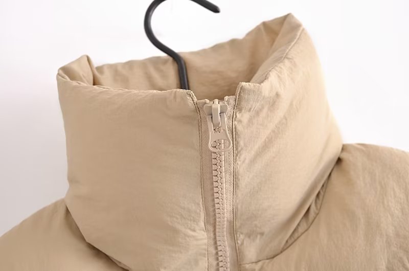 Langry beige puffer jacket vest with hood and zipper on hanger