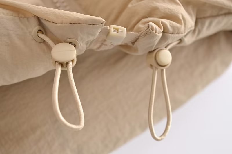 Langry fashion beige canvas drawstring bag with white cord closure