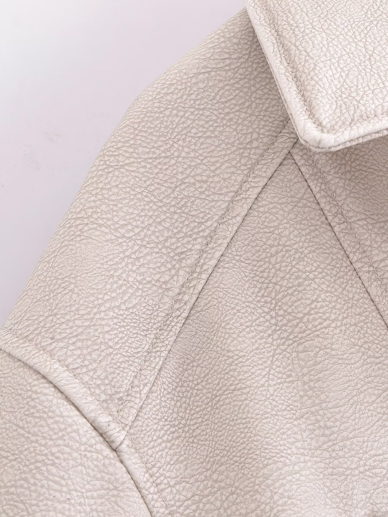 Retro washed faux leather jacket with cream textured surface and notched lapels