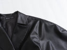 Langry faux leather Spring Street drawstring jacket with high collar and button closure