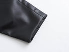 Langry faux leather clutch bag with smooth rounded corners for fashion
