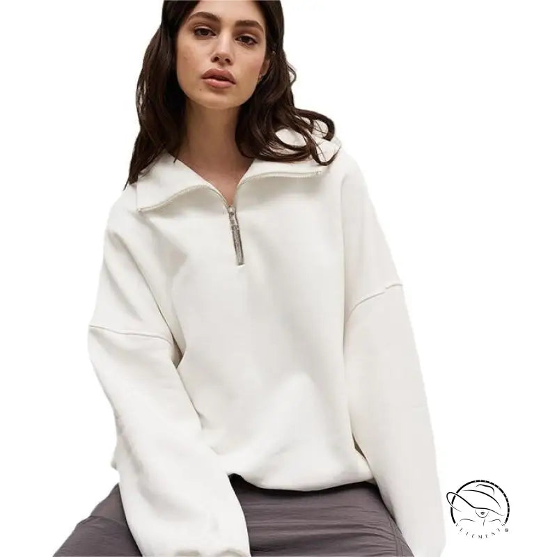 Woman in white half zipper autumn winter fleece lined sweater