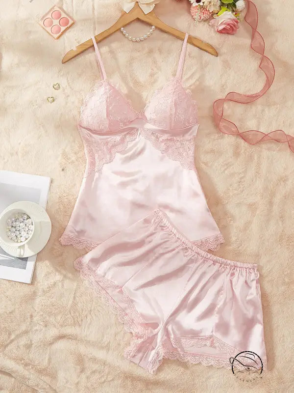 Delicate pink artificial silk camisole lingerie set with lace trim