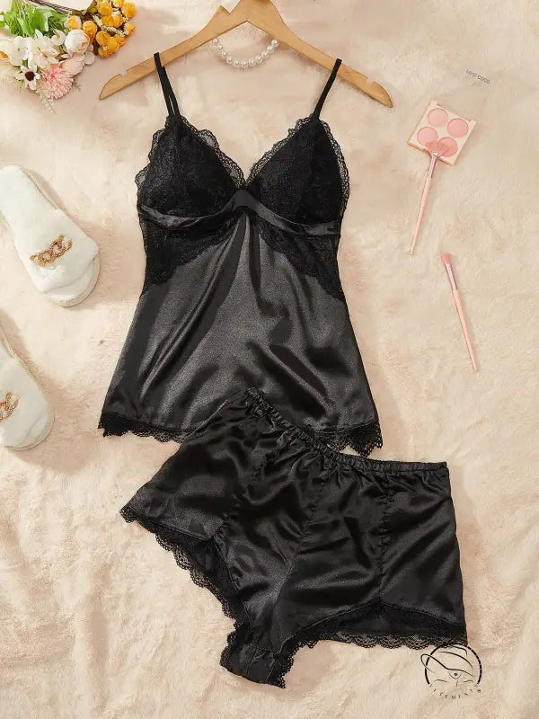 Black artificial silk camisole lingerie set with lace trim and thin straps