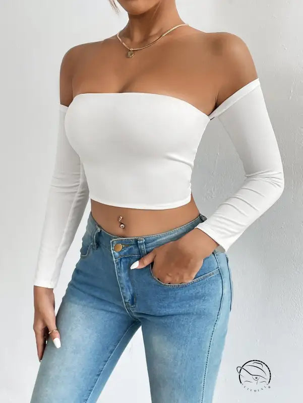 White off-shoulder camisole waist trimming short sleeve crop top with light wash jeans