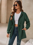 Green hooded drawstring jacket in outdoor raincoat for women