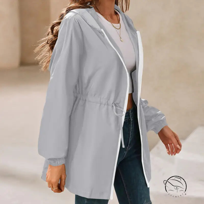 Gray hooded drawstring jacket as women’s hooded outdoor raincoat
