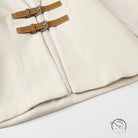 Elegant langry cream quilted cardigan coat with brown leather buckle details