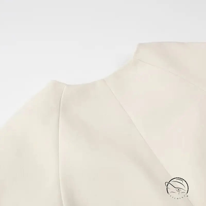 Elegant langry fashion cream sweater with metal buckle, high neck, long sleeves