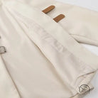 Elegant langry fashion cream tote bag with leather handles and metal buckle