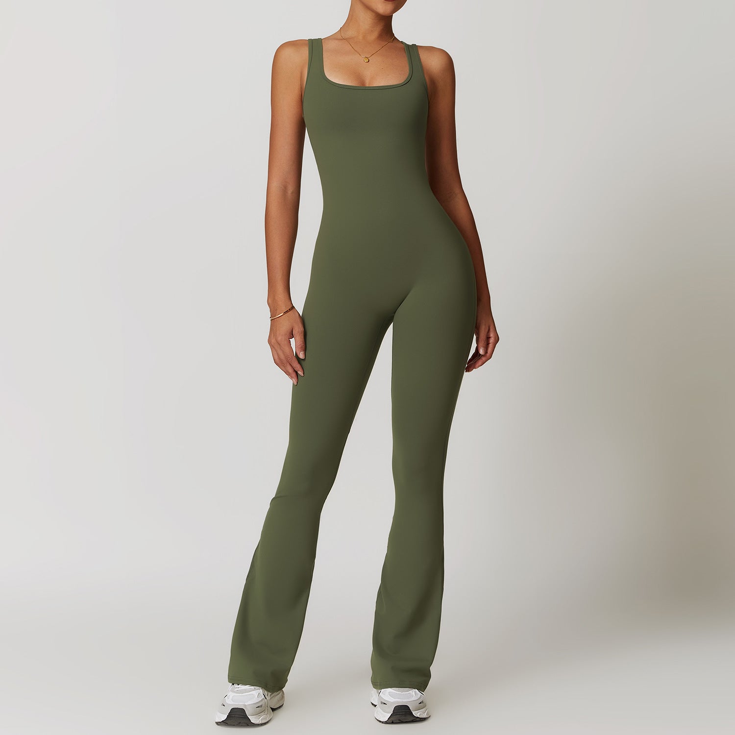 Olive green sleeveless fitted jumpsuit with flared legs for stylish yoga fashion ملابس
