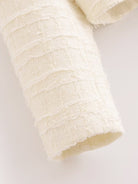 Cream lace fabric roll with floral texture for Langry fashion coats