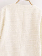White textured woolen sweater with grid pattern on wooden hanger, Langry fashion ملابس
