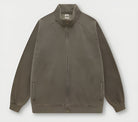 Olive green bomber jacket with zipper, ribbed collar, ideal for winter fashion ملابس