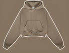 Beige cropped hoodie sweatshirt with front pocket, a trendy choice for winter fashion ملابس
