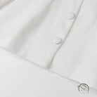 Elegant white langry fashion shirt with silver buttons in office blazer suit
