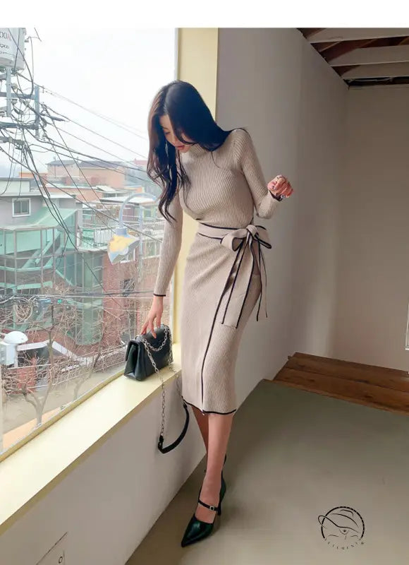 Langry fashion winter high neck slim mid length knit dress in beige with black trim