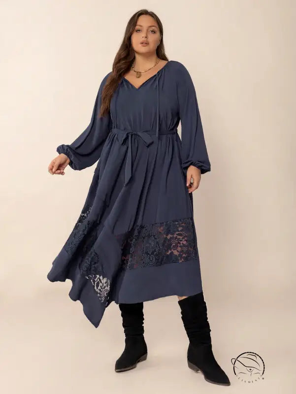 Winter cozy dress: plus-size long-sleeved midi in dark blue with lace and tie waist