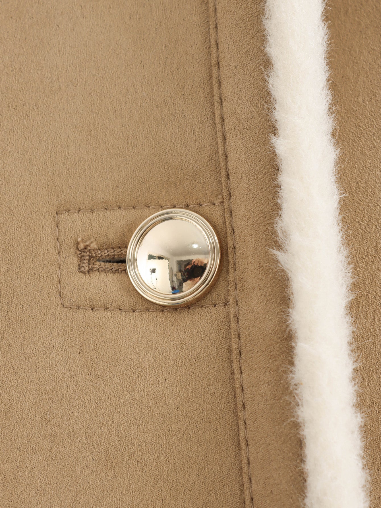 Winter fashion beige suede coat with silver buttons and white fur trim