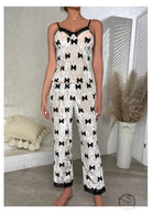 Women’s bowknot velvet pajamas in white with black bow print and lace trim