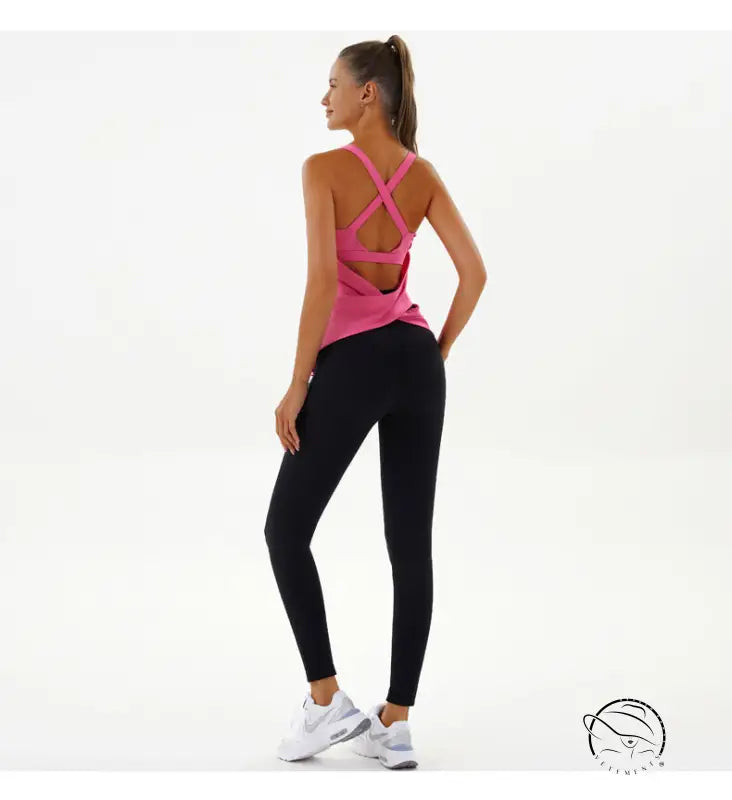 Woman in pink yoga breathable top and black leggings by Langry fashion