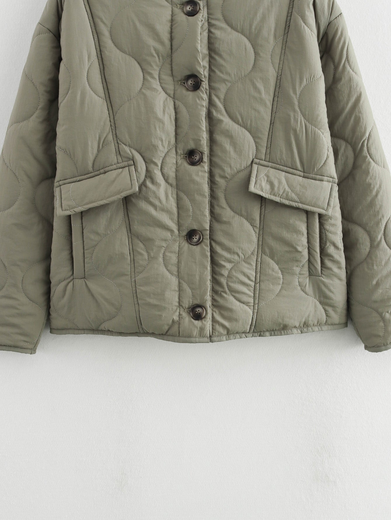 Olive green quilted jacket showcased in All Match Leopard Print Cotton Coat for fashion ملابس