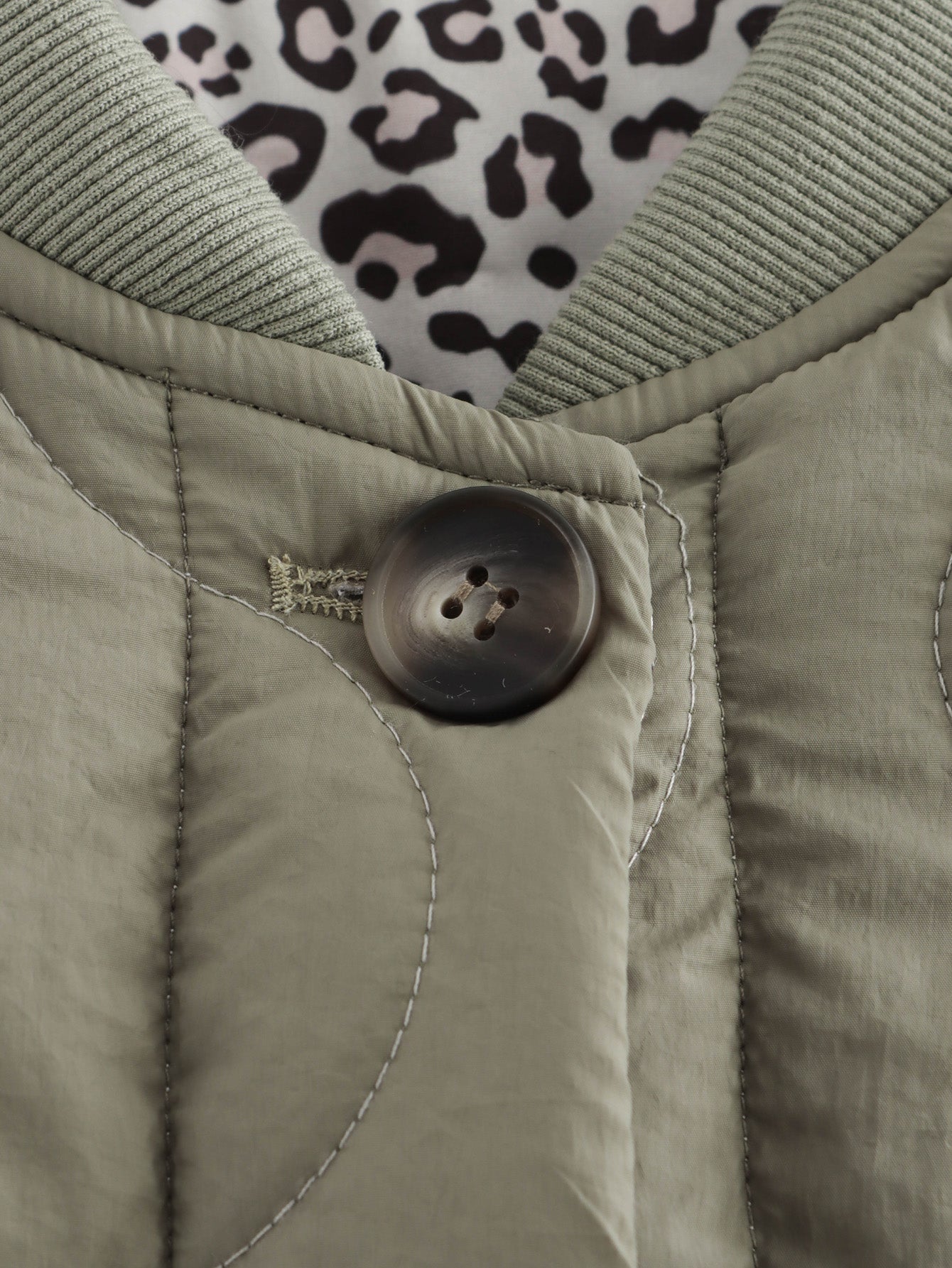 Olive green quilted jacket with button closure from the All Match Leopard Print Cotton Coat, fashion ملابس