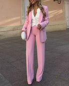 Pastel pink Langry fashion blazer with tuxedo collar and high-waist trousers