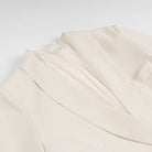 Langry fashion cream silk blouse with ruffled tuxedo collar