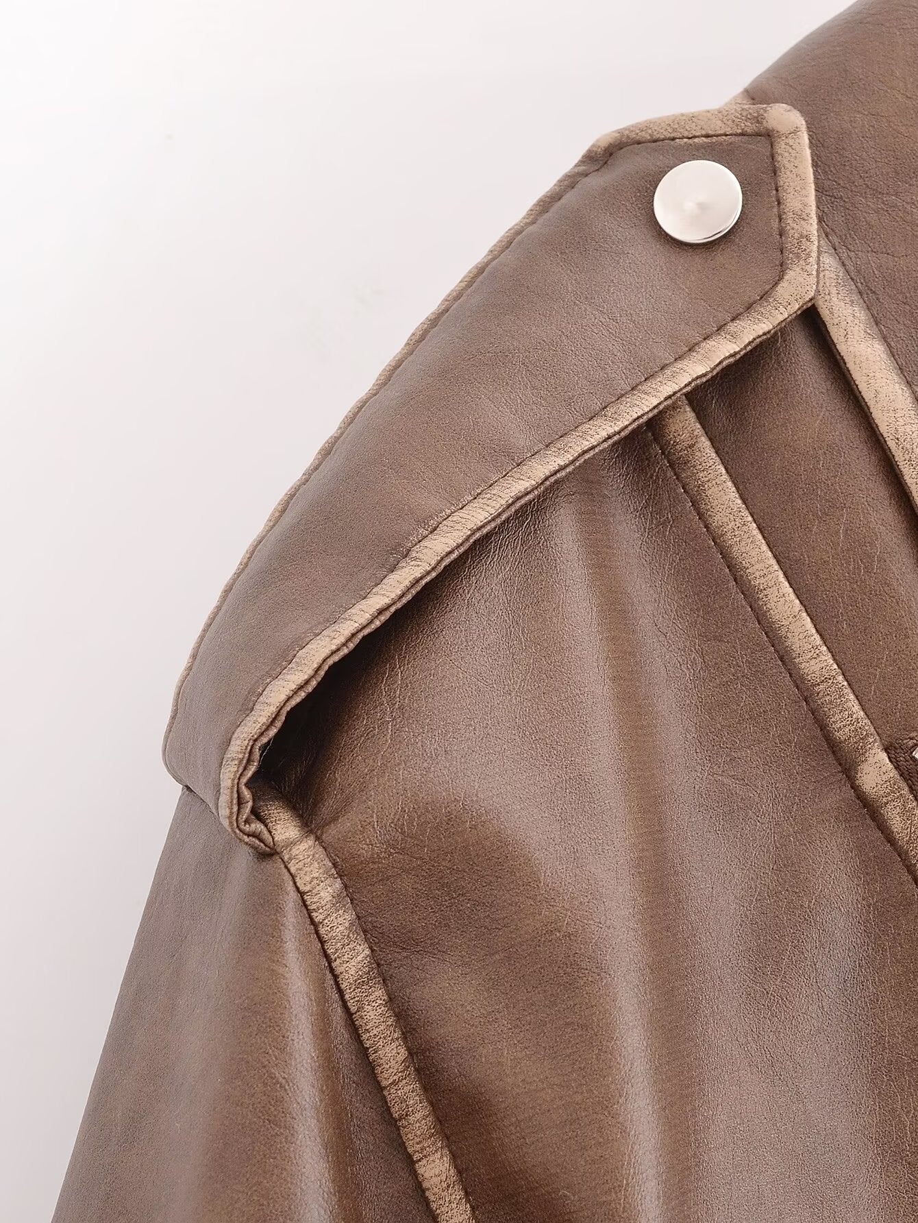 Winter Street faux leather motorcycle jacket with brown leather silver buttons and stitching details