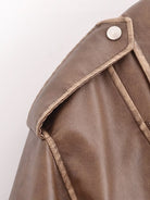 Winter Street faux leather motorcycle jacket with brown leather silver buttons and stitching details