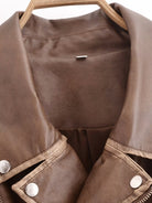 Winter Street faux leather motorcycle jacket in brown with silver hardware