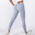 Light gray washed seamless yoga trousers with ruched back detailing