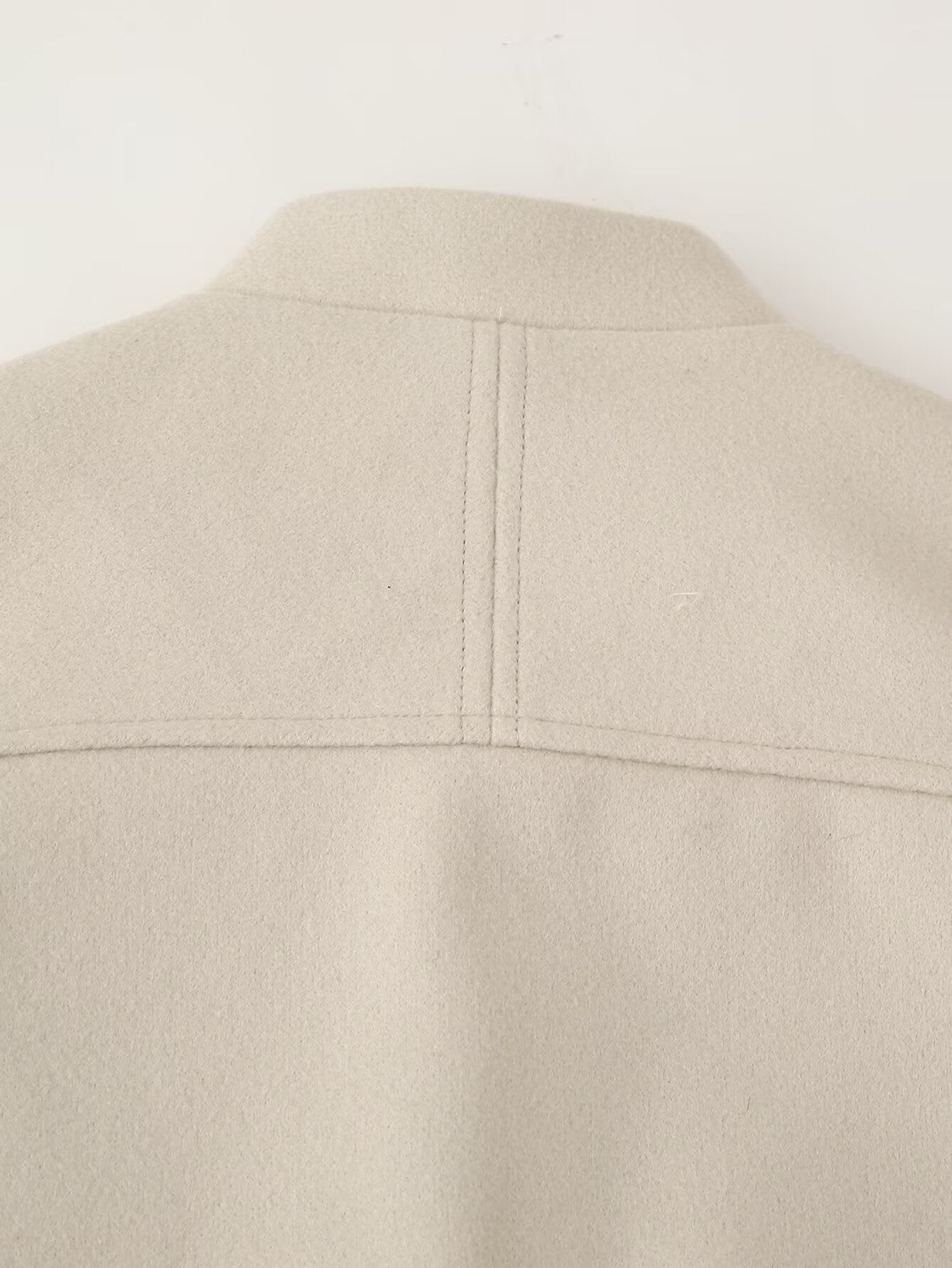 Beige single breasted Langry casual pocket jacket with smooth texture