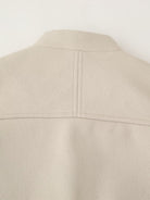 Beige single breasted Langry casual pocket jacket with smooth texture