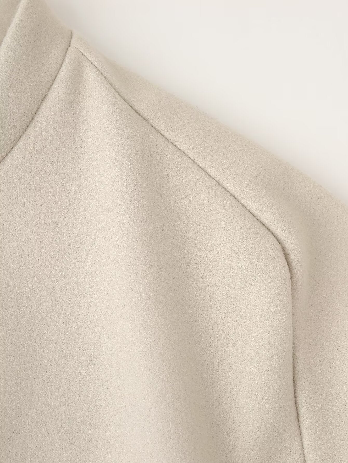 Beige ribbed high-neck sweater in Langry single breasted jacket