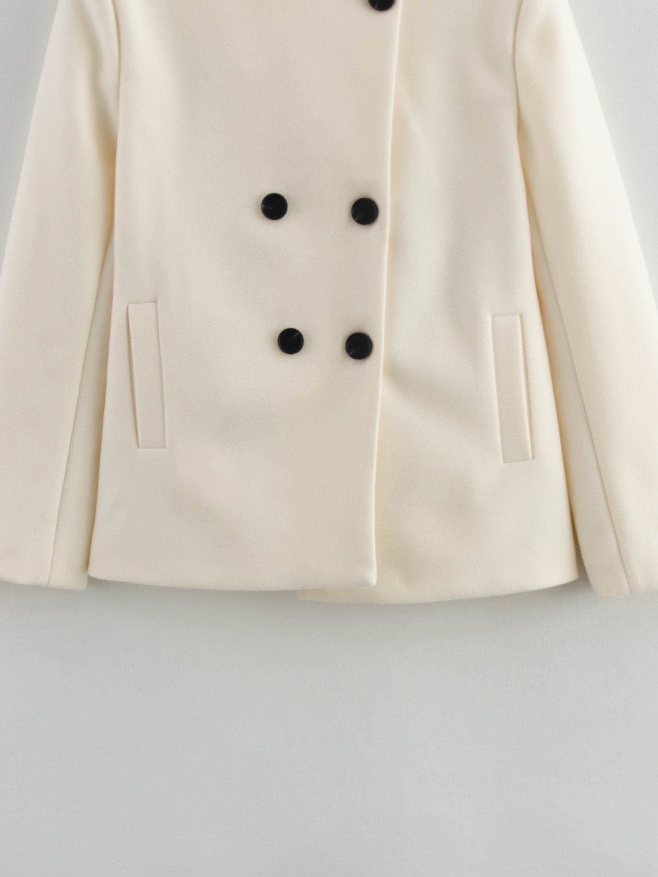 Cream double-breasted woolen coat with black buttons, Langry fashion ملابس