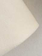 White fluffy bath sponge with textured foam surface for Langry fashion ملابس