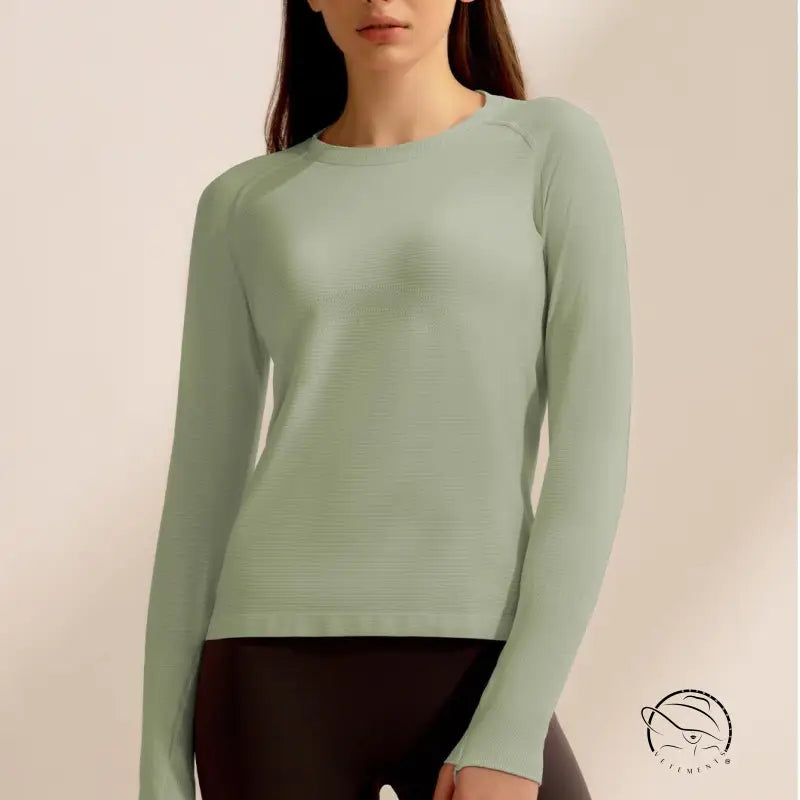 Mint green long-sleeved crewneck sweater for running fashion ملابس